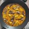 arroz con presa iberica y alcachofas